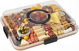Gourmet platter with meats and olives.