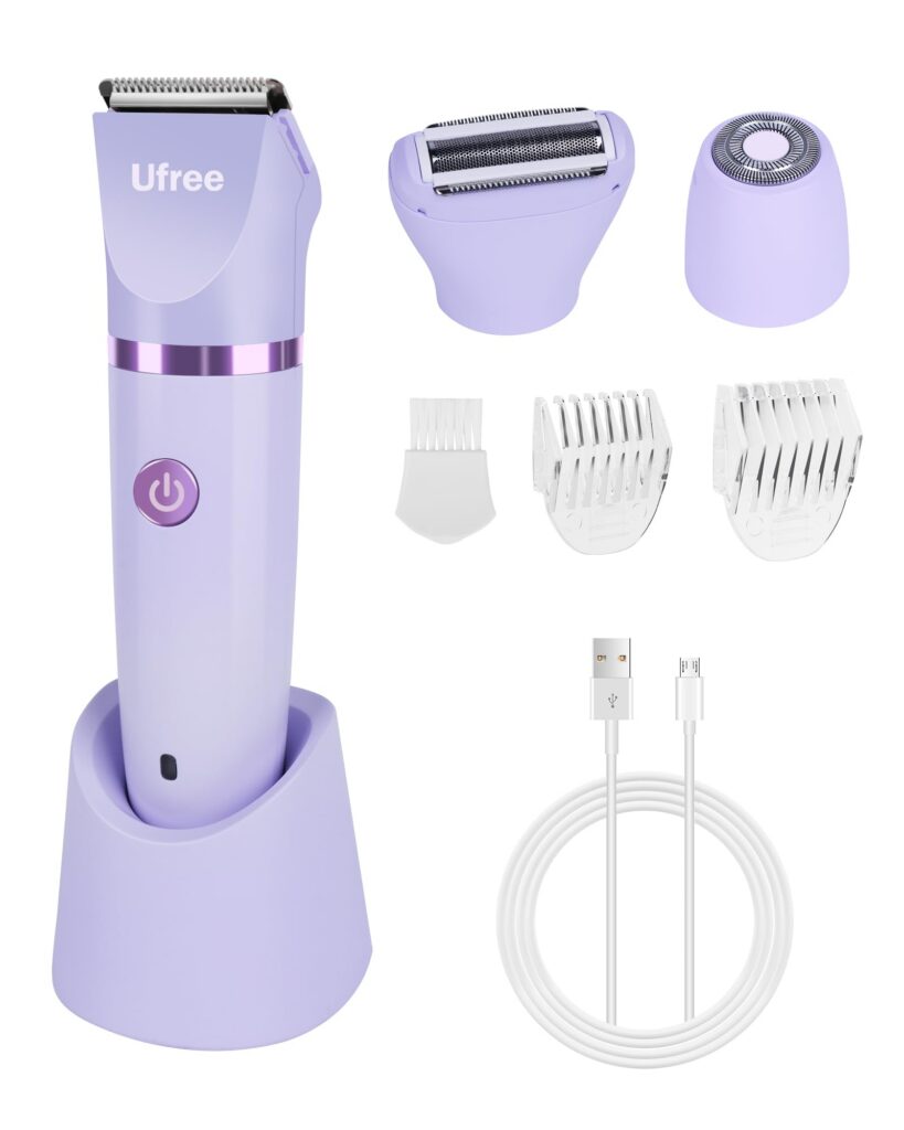 Purple electric shaver with attachments and charger.