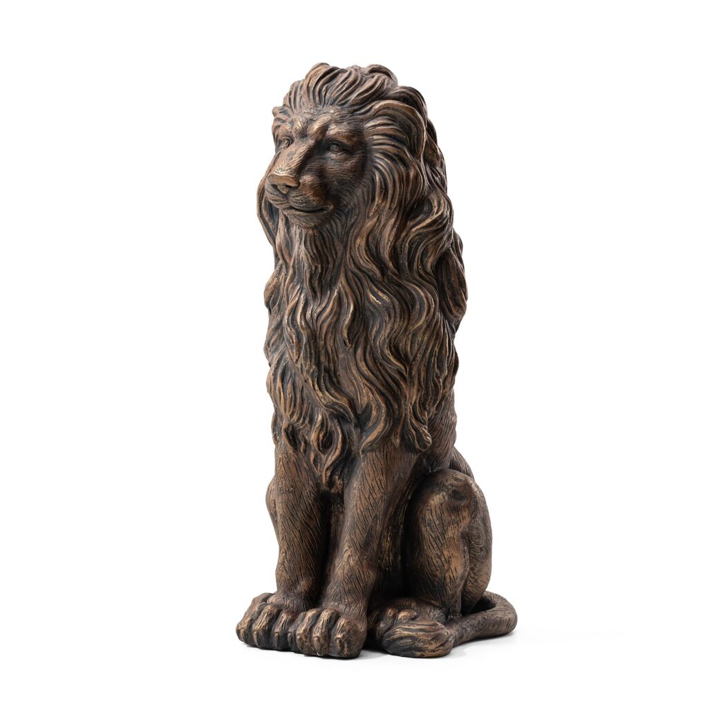 Bronze lion statue sitting majestically upright.