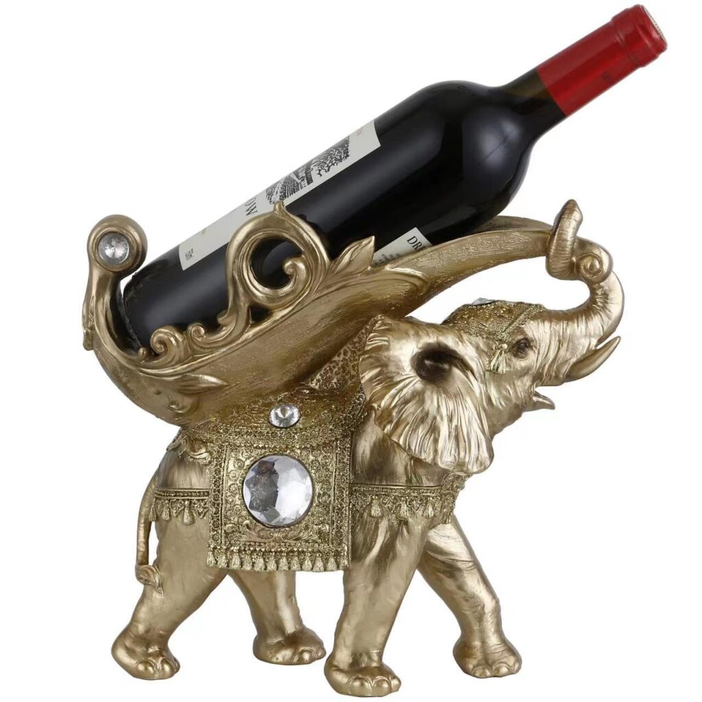Elephant-shaped wine holder with ornate design.