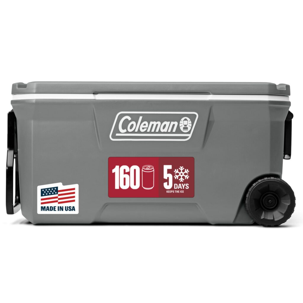 Gray Coleman cooler with wheels and handle.