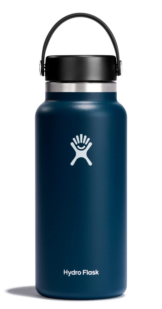 Blue insulated water bottle with handle.