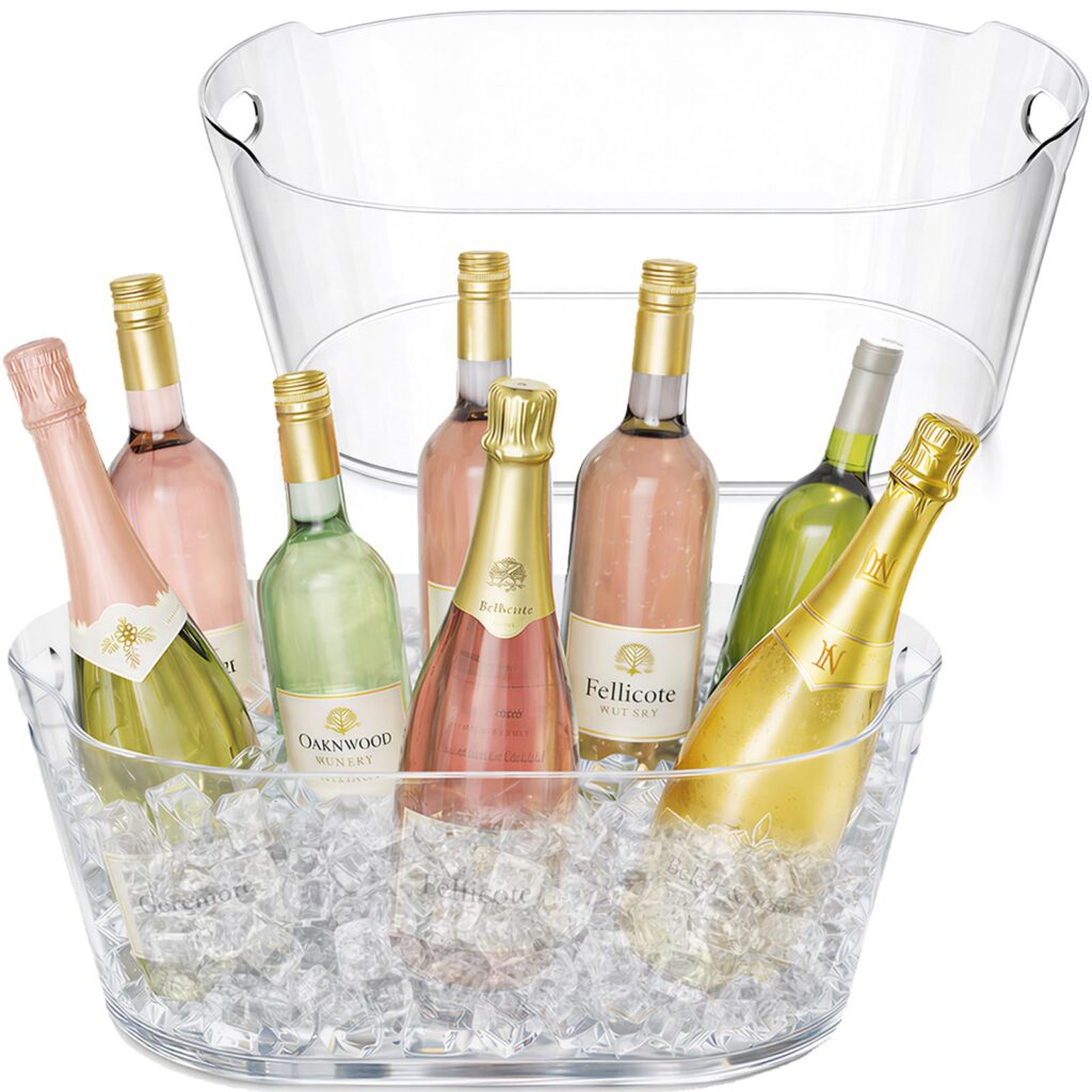 Wine bottles chilled in clear ice bucket.